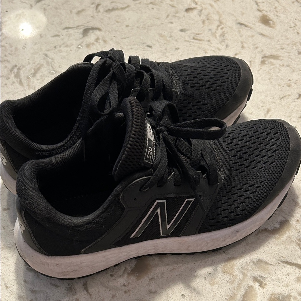 New Balance men’s 520 Black and White Running Shoes.  Size 9